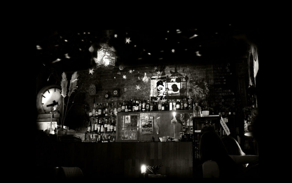 zeigt ein schwarz weiss Bild von der Bar